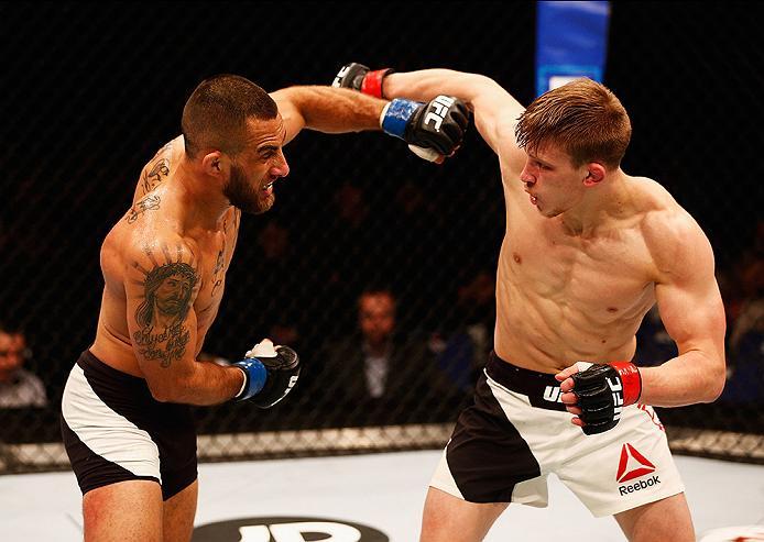 LONDON, ENGLAND - FEBRUARY 27: Arnold 'Almighty' Allen of England (R) and Yaotzin Meza of the USA (L) compete in their Featherweight bout during the UFC Fight Night held at at Indigo at The O2 Arena on February 27, 2016 in London, England. (Photo by Dea