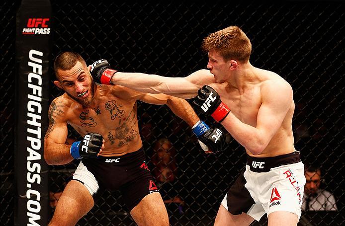 LONDON, ENGLAND - FEBRUARY 27: Arnold 'Almighty' Allen of England (R) and Yaotzin Meza of the USA (L) compete in their Featherweight bout during the UFC Fight Night held at at Indigo at The O2 Arena on February 27, 2016 in London, England. (Photo by Dea