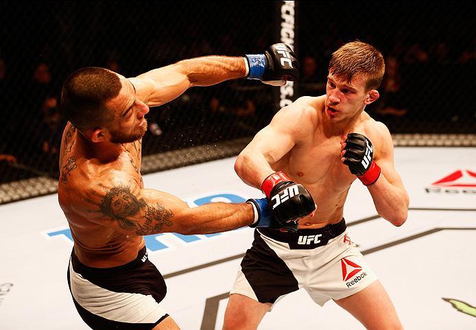 LONDON, ENGLAND - FEBRUARY 27: Arnold 'Almighty' Allen of England (R) and Yaotzin Meza of the USA (L) compete in their Featherweight bout during the UFC Fight Night held at at Indigo at The O2 Arena on February 27, 2016 in London, England. (Photo by Dea