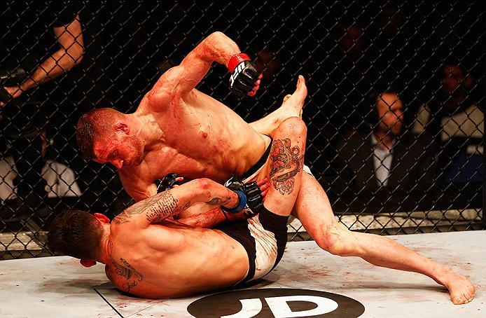 LONDON, ENGLAND - FEBRUARY 27: Davey 'Dangerous' Grant of England (R) and Marlon 'Chito' Vera of Ecuador (L) compete in their Bantamweight bout during the UFC Fight Night held at at Indigo at The O2 Arena on February 27, 2016 in London, England. (Photo