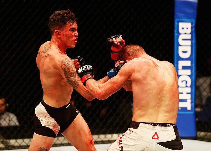 LONDON, ENGLAND - FEBRUARY 27: Davey 'Dangerous' Grant of England (R) and Marlon 'Chito' Vera of Ecuador (L) compete in their Bantamweight bout during the UFC Fight Night held at at Indigo at The O2 Arena on February 27, 2016 in London, England. (Photo