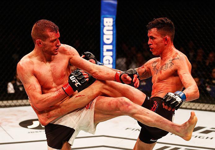 LONDON, ENGLAND - FEBRUARY 27: Davey 'Dangerous' Grant of England (L) and Marlon 'Chito' Vera of Ecuador (R) compete in their Bantamweight bout during the UFC Fight Night held at at Indigo at The O2 Arena on February 27, 2016 in London, England. (Photo