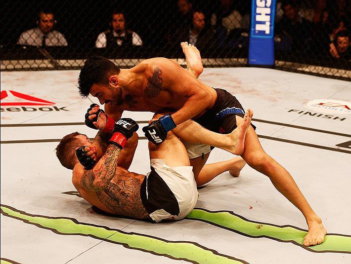 LONDON, ENGLAND - FEBRUARY 27: Mike 'The Warrior' Wilkinson of England (L) and Makwan 'Mr. Finland' Amirkhani of Kurdistan (R) compete in their Featherweight bout during the UFC Fight Night held at at Indigo at The O2 Arena on February 27, 2016 in London