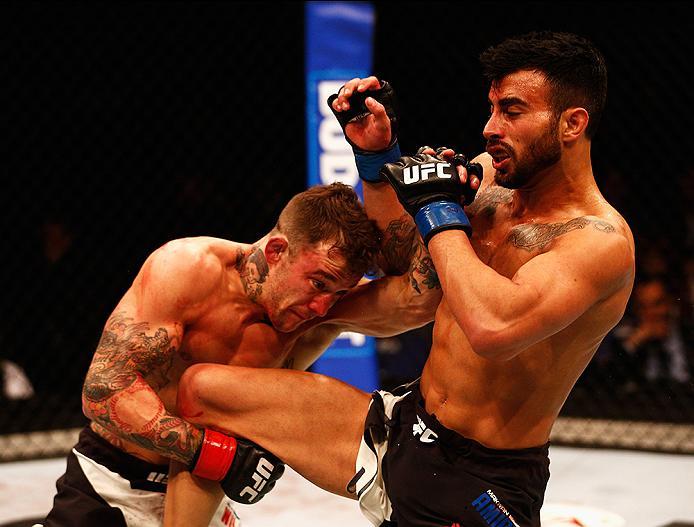 LONDON, ENGLAND - FEBRUARY 27: Mike 'The Warrior' Wilkinson of England (L) and Makwan 'Mr. Finland' Amirkhani of Kurdistan (R) compete in their Featherweight bout during the UFC Fight Night held at at Indigo at The O2 Arena on February 27, 2016 in London