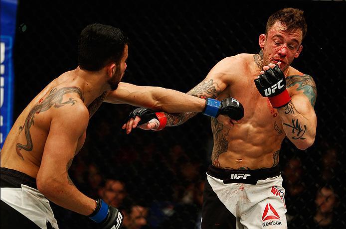 LONDON, ENGLAND - FEBRUARY 27: Mike 'The Warrior' Wilkinson of England (R) and Makwan 'Mr. Finland' Amirkhani of Kurdistan (L) compete in their Featherweight bout during the UFC Fight Night held at at Indigo at The O2 Arena on February 27, 2016 in London