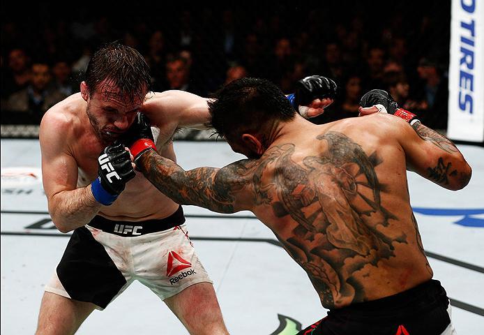 LONDON, ENGLAND - FEBRUARY 27: Francisco 'Cisco' Rivera of the USA (R) and Brad 'One Punch' Pickett of England (L) compete in their Bantamweight bout during the UFC Fight Night held at at Indigo at The O2 Arena on February 27, 2016 in London, England. (