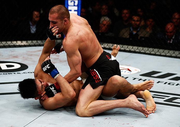 LONDON, ENGLAND - FEBRUARY 27: Tom Breese of England (R) and Keita 'K-Taro' Nakamura of Japan (L) compete in their Welterweight bout during the UFC Fight Night held at at Indigo at The O2 Arena on February 27, 2016 in London, England. (Photo by Dean Mou