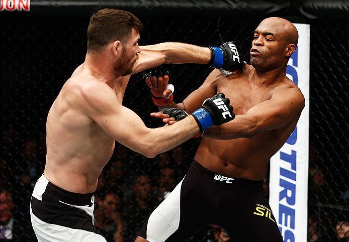 LONDON, ENGLAND - FEBRUARY 27: Anderson 'The Spider' Silva of Brazil (R) and Michael 'The Count' Bisping of England (L) compete in their Middleweight bout during the UFC Fight Night held at at Indigo at The O2 Arena on February 27, 2016 in London, Englan