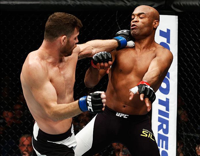 LONDON, ENGLAND - FEBRUARY 27: Anderson 'The Spider' Silva of Brazil (R) and Michael 'The Count' Bisping of England (L) compete in their Middleweight bout during the UFC Fight Night held at at Indigo at The O2 Arena on February 27, 2016 in London, Englan