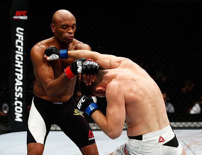 LONDON, ENGLAND - FEBRUARY 27: Anderson 'The Spider' Silva of Brazil (L) and Michael 'The Count' Bisping of England (R) compete in their Middleweight bout during the UFC Fight Night held at at Indigo at The O2 Arena on February 27, 2016 in London, Englan