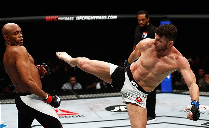 LONDON, ENGLAND - FEBRUARY 27: Anderson 'The Spider' Silva of Brazil (L) and Michael 'The Count' Bisping of England (R) compete in their Middleweight bout during the UFC Fight Night held at at Indigo at The O2 Arena on February 27, 2016 in London, Englan