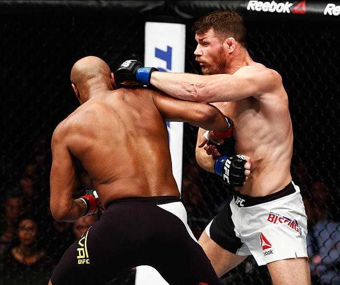 LONDON, ENGLAND - FEBRUARY 27: Anderson 'The Spider' Silva of Brazil (L) and Michael 'The Count' Bisping of England (R) compete in their Middleweight bout during the UFC Fight Night held at at Indigo at The O2 Arena on February 27, 2016 in London, Englan