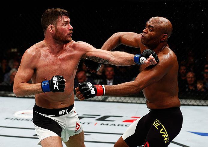 LONDON, ENGLAND - FEBRUARY 27: Anderson 'The Spider' Silva of Brazil (R) and Michael 'The Count' Bisping of England (L) compete in their Middleweight bout during the UFC Fight Night held at at Indigo at The O2 Arena on February 27, 2016 in London, Englan