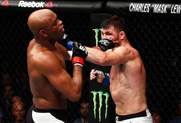 LONDON, ENGLAND - FEBRUARY 27: Anderson 'The Spider' Silva of Brazil (L) and Michael 'The Count' Bisping of England (R) compete in their Middleweight bout during the UFC Fight Night held at at Indigo at The O2 Arena on February 27, 2016 in London, Englan