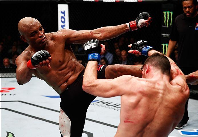 LONDON, ENGLAND - FEBRUARY 27: Anderson 'The Spider' Silva of Brazil (L) and Michael 'The Count' Bisping of England (R) compete in their Middleweight bout during the UFC Fight Night held at at Indigo at The O2 Arena on February 27, 2016 in London, Englan