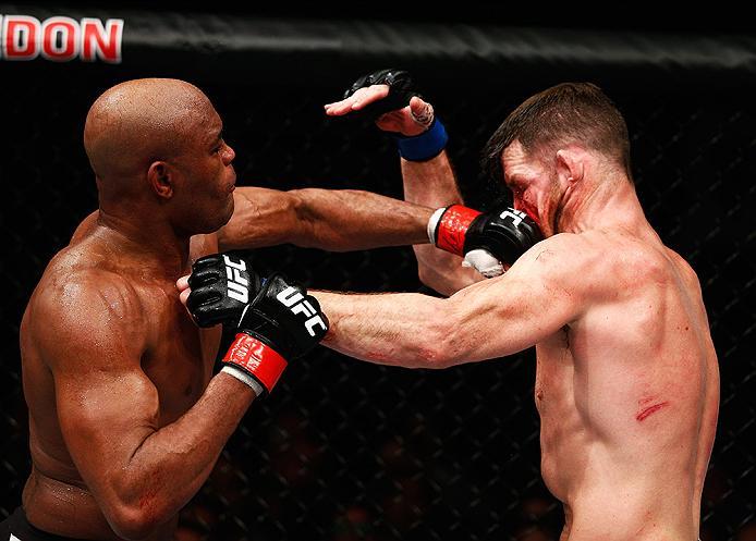 LONDON, ENGLAND - FEBRUARY 27: Anderson 'The Spider' Silva of Brazil (L) and Michael 'The Count' Bisping of England (R) compete in their Middleweight bout during the UFC Fight Night held at at Indigo at The O2 Arena on February 27, 2016 in London, Englan