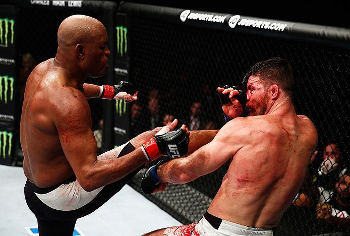 LONDON, ENGLAND - FEBRUARY 27: Anderson 'The Spider' Silva of Brazil (L) and Michael 'The Count' Bisping of England (R) compete in their Middleweight bout during the UFC Fight Night held at at Indigo at The O2 Arena on February 27, 2016 in London, Englan