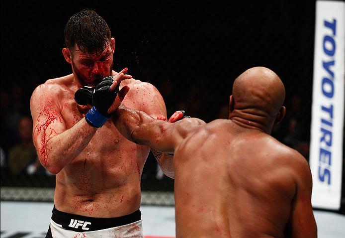 LONDON, ENGLAND - FEBRUARY 27: Anderson 'The Spider' Silva of Brazil (R) and Michael 'The Count' Bisping of England (L) compete in their Middleweight bout during the UFC Fight Night held at at Indigo at The O2 Arena on February 27, 2016 in London, Englan