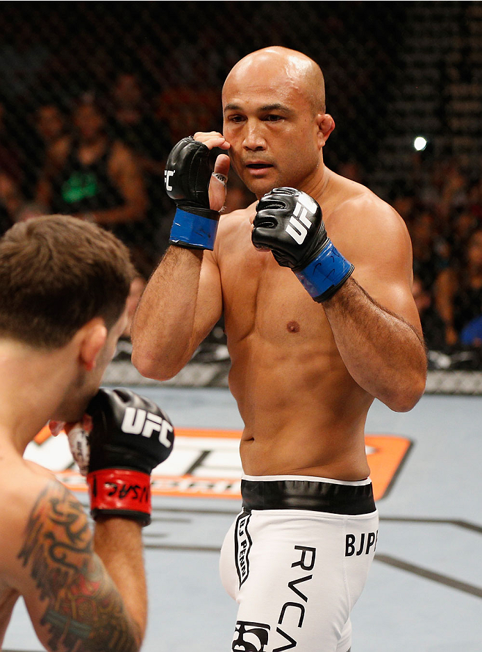 LAS VEGAS, NV - JULY 06: (R-L) BJ Penn squares off with Frankie Edgar in their featherweight fight during the Ultimate Fighter Finale inside the Mandalay Bay Events Center on July 6, 2014 in Las Vegas, Nevada. (Photo by Josh Hedges/Zuffa LLC/Zuffa LLC v