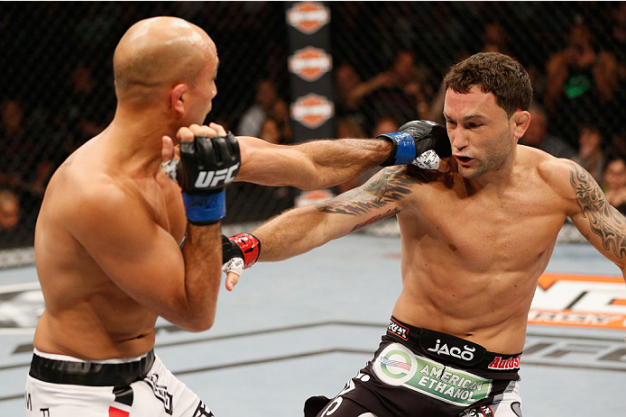 LAS VEGAS, NV - JULY 06: (L-R) BJ Penn and Frankie Edgar exchange punches in their featherweight fight during the Ultimate Fighter Finale inside the Mandalay Bay Events Center on July 6, 2014 in Las Vegas, Nevada. (Photo by Josh Hedges/Zuffa LLC/Zuffa L