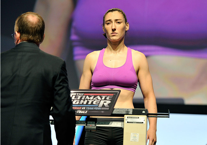 LAS VEGAS, NV - JULY 05: Mixed martial artist Alexis Dufresne poses on the scale during the TUF 19 Finale weigh-in at the Mandalay Bay Convention Center on July 5, 2014 in Las Vegas, Nevada. (Photo by David Becker/Zuffa LLC/Zuffa LLC via Getty Images)