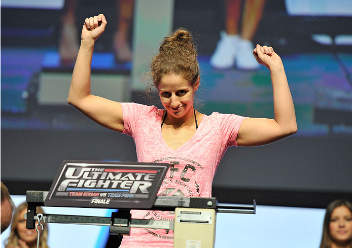 LAS VEGAS, NV - JULY 05: Mixed martial artist Sarah Moras poses on the scale during the TUF 19 Finale weigh-in at the Mandalay Bay Convention Center on July 5, 2014 in Las Vegas, Nevada. (Photo by David Becker/Zuffa LLC/Zuffa LLC via Getty Images)
