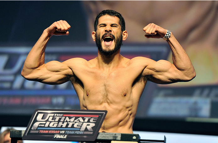 LAS VEGAS, NV - JULY 05: Mixed martial artist Juan Manuel Puig poses on the scale during the TUF 19 Finale weigh-in at the Mandalay Bay Convention Center on July 5, 2014 in Las Vegas, Nevada. (Photo by David Becker/Zuffa LLC/Zuffa LLC via Getty Images)