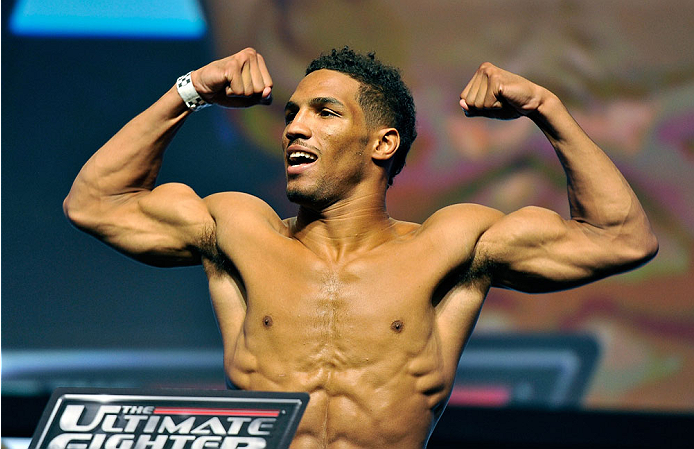 LAS VEGAS, NV - JULY 05: Mixed martial artist Kevin Lee poses on the scale during the TUF 19 Finale weigh-in at the Mandalay Bay Convention Center on July 5, 2014 in Las Vegas, Nevada. (Photo by David Becker/Zuffa LLC/Zuffa LLC via Getty Images)