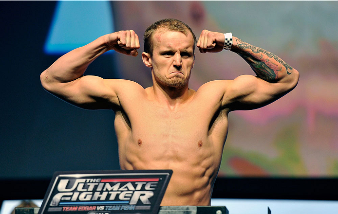 LAS VEGAS, NV - JULY 05: Mixed martial artist Jesse Ronson poses on the scale during the TUF 19 Finale weigh-in at the Mandalay Bay Convention Center on July 5, 2014 in Las Vegas, Nevada. (Photo by David Becker/Zuffa LLC/Zuffa LLC via Getty Images)