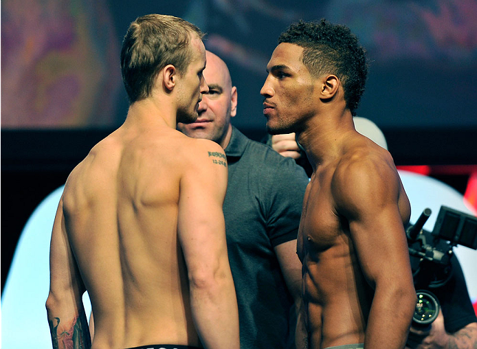 LAS VEGAS, NV - JULY 05: Mixed martial artists Jesse Ronson (L) and Kevin Lee face off during the TUF 19 Finale weigh-in at the Mandalay Bay Convention Center on July 5, 2014 in Las Vegas, Nevada. (Photo by David Becker/Zuffa LLC/Zuffa LLC via Getty Ima