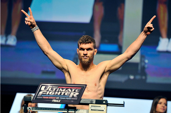 LAS VEGAS, NV - JULY 05: Mixed martial artist Dustin Ortiz poses on the scale during the TUF 19 Finale weigh-in at the Mandalay Bay Convention Center on July 5, 2014 in Las Vegas, Nevada. (Photo by David Becker/Zuffa LLC/Zuffa LLC via Getty Images)