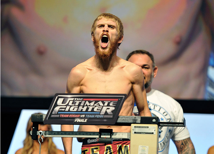 LAS VEGAS, NV - JULY 05: Mixed martial artist Justin Scoggins poses on the scale during the TUF 19 Finale weigh-in at the Mandalay Bay Convention Center on July 5, 2014 in Las Vegas, Nevada. (Photo by David Becker/Zuffa LLC/Zuffa LLC via Getty Images)