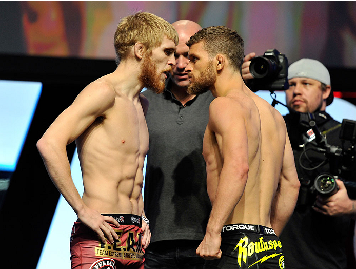 LAS VEGAS, NV - JULY 05: Mixed martial artists Justin Scoggins (L) and Dustin Ortiz face off during the TUF 19 Finale weigh-in at the Mandalay Bay Convention Center on July 5, 2014 in Las Vegas, Nevada. (Photo by David Becker/Zuffa LLC/Zuffa LLC via Get