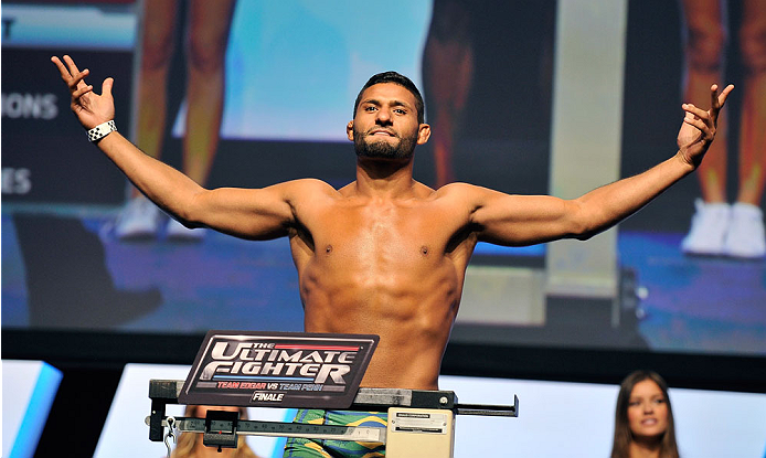 LAS VEGAS, NV - JULY 05: Mixed martial artist Dhiego Lima poses on the scale during the TUF 19 Finale weigh-in at the Mandalay Bay Convention Center on July 5, 2014 in Las Vegas, Nevada. (Photo by David Becker/Zuffa LLC/Zuffa LLC via Getty Images)