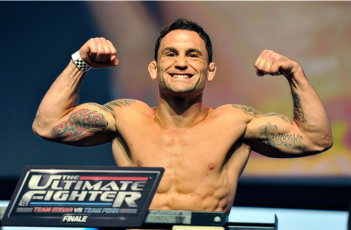 LAS VEGAS, NV - JULY 05: Mixed martial artist Frankie Edgar poses on the scale during the TUF 19 Finale weigh-in at the Mandalay Bay Convention Center on July 5, 2014 in Las Vegas, Nevada. (Photo by David Becker/Zuffa LLC/Zuffa LLC via Getty Images)