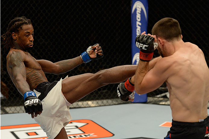 LAS VEGAS, NV - JULY 12: (L-R) Willie Gates kicks Darrell Montague in their flyweight bout during the Ultimate Fighter Finale inside MGM Grand Garden Arena on July 12, 2015 in Las Vegas, Nevada. (Photo by Brandon Magnus/Zuffa LLC/Zuffa LLC via Getty Ima
