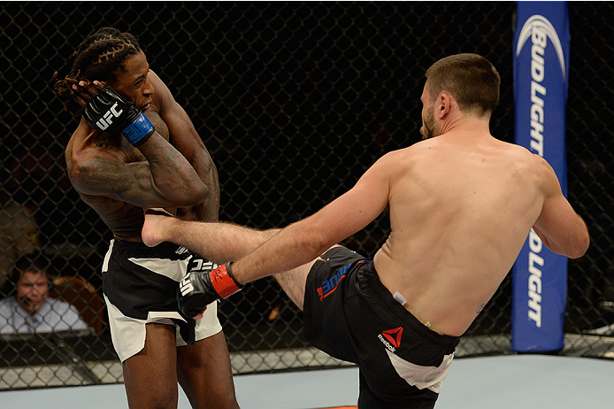LAS VEGAS, NV - JULY 12: (R-L) Darrell Montague kicks Willie Gates in their flyweight bout during the Ultimate Fighter Finale inside MGM Grand Garden Arena on July 12, 2015 in Las Vegas, Nevada. (Photo by Brandon Magnus/Zuffa LLC/Zuffa LLC via Getty Ima