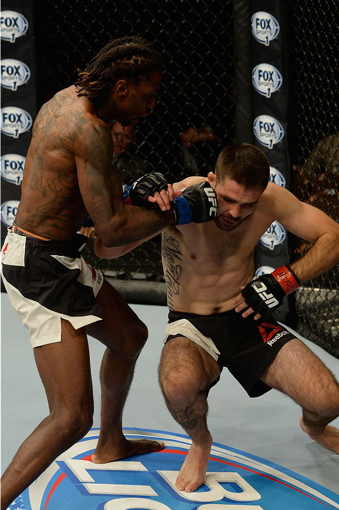 LAS VEGAS, NV - JULY 12: (L-R) Willie Gates punches Darrell Montague in their flyweight bout during the Ultimate Fighter Finale inside MGM Grand Garden Arena on July 12, 2015 in Las Vegas, Nevada. (Photo by Brandon Magnus/Zuffa LLC/Zuffa LLC via Getty I