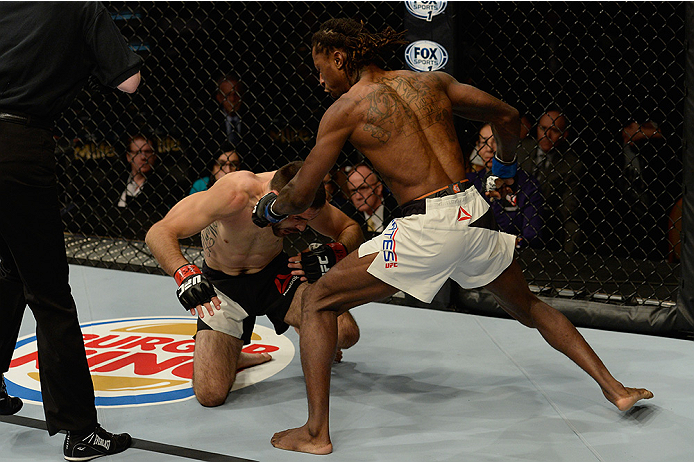 LAS VEGAS, NV - JULY 12: (R-L) Willie Gates punches Darrell Montague in their flyweight bout during the Ultimate Fighter Finale inside MGM Grand Garden Arena on July 12, 2015 in Las Vegas, Nevada. (Photo by Brandon Magnus/Zuffa LLC/Zuffa LLC via Getty I