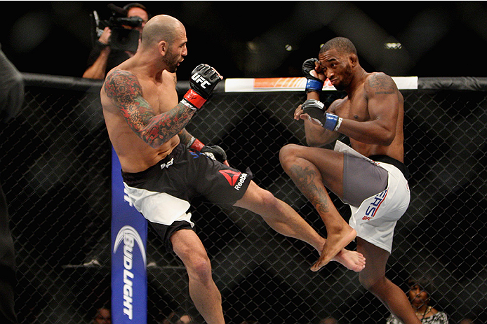 LAS VEGAS, NV - JULY 12: (L) George Sullivan kicks Dominic Waters in their welterweight bout during the Ultimate Fighter Finale inside MGM Grand Garden Arena on July 12, 2015 in Las Vegas, Nevada. (Photo by Mitch Viquez/Zuffa LLC/Zuffa LLC via Getty Ima