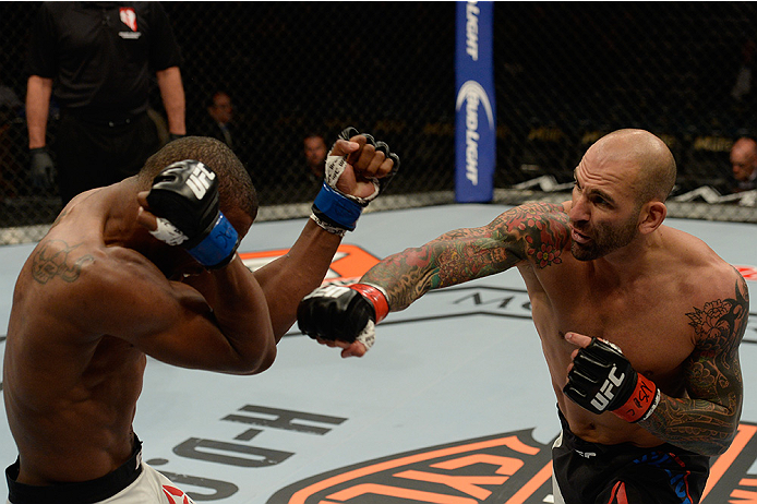 LAS VEGAS, NV - JULY 12: (R-L) George Sullivan punches Dominic Waters in their welterweight bout during the Ultimate Fighter Finale inside MGM Grand Garden Arena on July 12, 2015 in Las Vegas, Nevada. (Photo by Brandon Magnus/Zuffa LLC/Zuffa LLC via Get