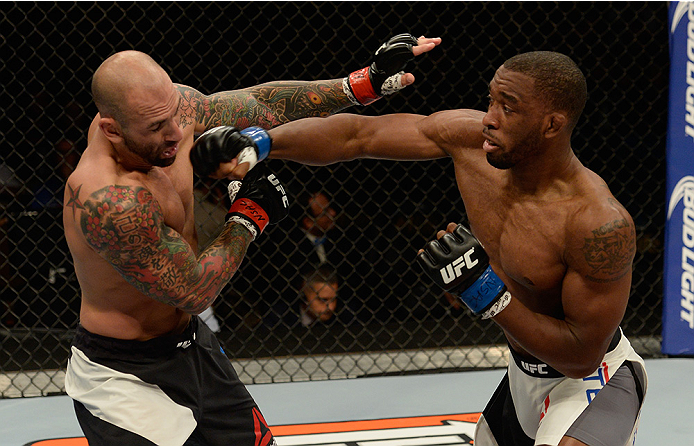 LAS VEGAS, NV - JULY 12: (R-L) Dominic Waters punches George Sullivan in their welterweight bout during the Ultimate Fighter Finale inside MGM Grand Garden Arena on July 12, 2015 in Las Vegas, Nevada. (Photo by Brandon Magnus/Zuffa LLC/Zuffa LLC via Get