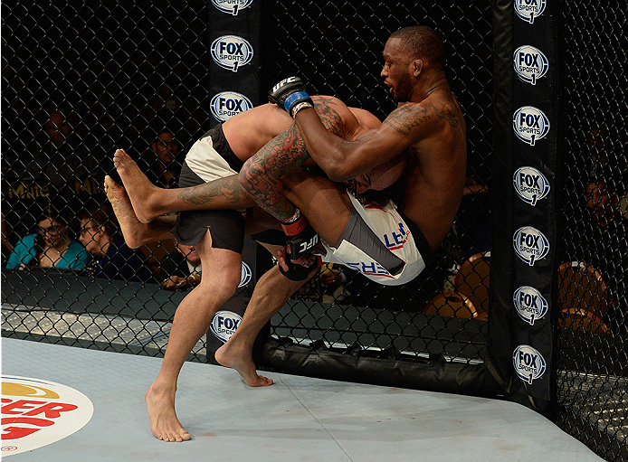 LAS VEGAS, NV - JULY 12: (L-R) George Sullivan slams Dominic Waters in their welterweight bout during the Ultimate Fighter Finale inside MGM Grand Garden Arena on July 12, 2015 in Las Vegas, Nevada. (Photo by Brandon Magnus/Zuffa LLC/Zuffa LLC via Getty