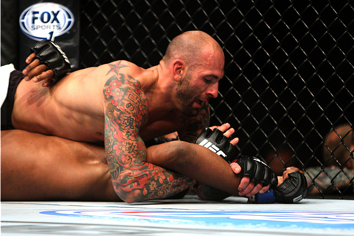 LAS VEGAS, NV - JULY 12: (Top) George Sullivan attempts to submit Dominic Waters in their welterweight bout during the Ultimate Fighter Finale inside MGM Grand Garden Arena on July 12, 2015 in Las Vegas, Nevada. (Photo by Mitch Viquez/Zuffa LLC/Zuffa LL