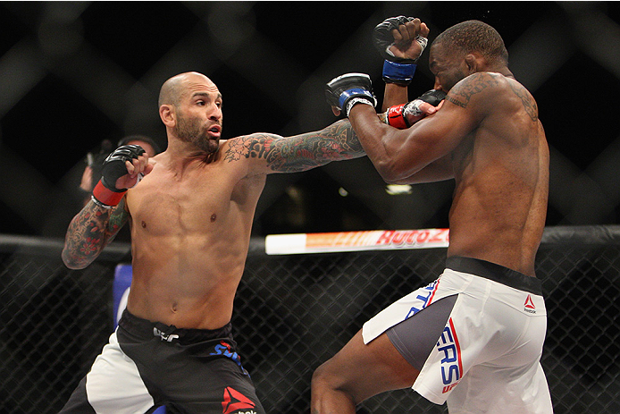 LAS VEGAS, NV - JULY 12: (L) George Sullivan punches Dominic Waters in their welterweight bout during the Ultimate Fighter Finale inside MGM Grand Garden Arena on July 12, 2015 in Las Vegas, Nevada. (Photo by Mitch Viquez/Zuffa LLC/Zuffa LLC via Getty I