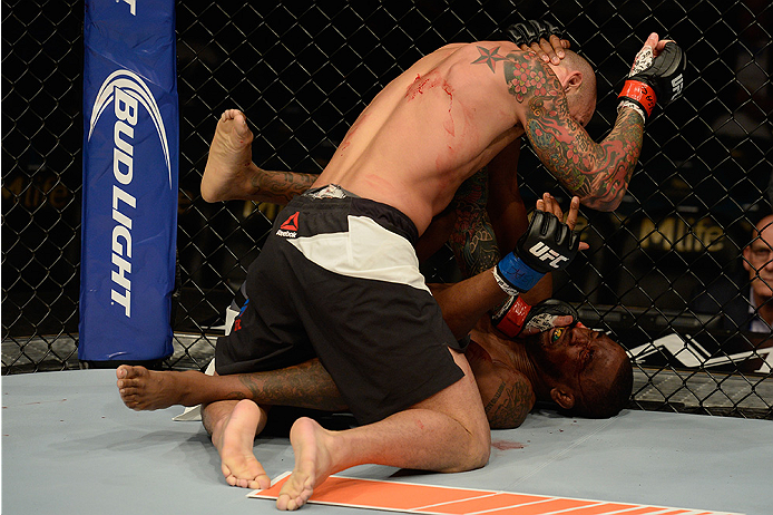 LAS VEGAS, NV - JULY 12: George Sullivan (top) punches Dominic Waters in their welterweight bout during the Ultimate Fighter Finale inside MGM Grand Garden Arena on July 12, 2015 in Las Vegas, Nevada. (Photo by Brandon Magnus/Zuffa LLC/Zuffa LLC via Get