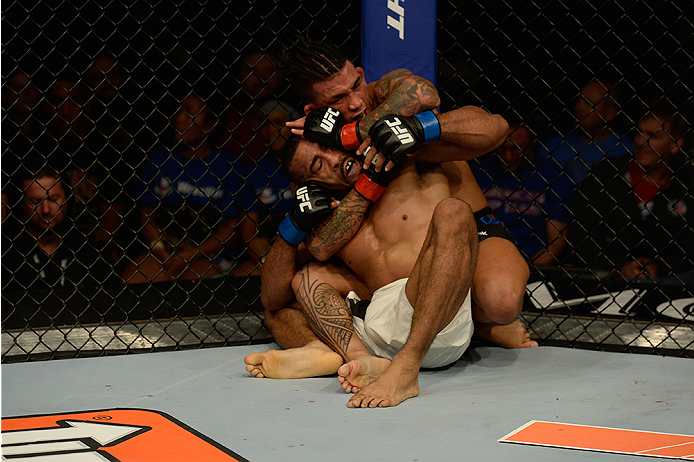 LAS VEGAS, NV - JULY 12: Russell Doane (top) attempts to submit Jerrod Sanders in their bantamweight bout during the Ultimate Fighter Finale inside MGM Grand Garden Arena on July 12, 2015 in Las Vegas, Nevada. (Photo by Brandon Magnus/Zuffa LLC/Zuffa LL
