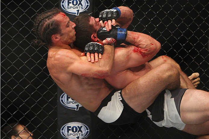 LAS VEGAS, NV - JULY 12: (L-R) Josh Samman attempts a rear naked choke on Caio Magalhaes in their middleweight bout during the Ultimate Fighter Finale inside MGM Grand Garden Arena on July 12, 2015 in Las Vegas, Nevada. (Photo by Mitch Viquez/Zuffa LLC/
