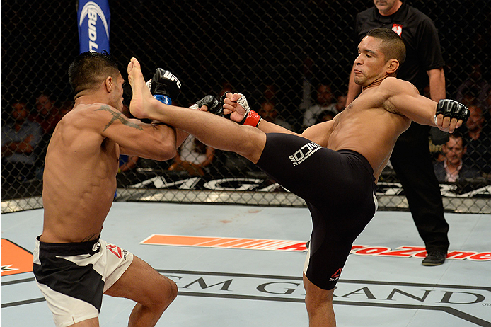 LAS VEGAS, NV - JULY 12: (R-L) Maximo Blanco kicks Mike De La Torre in their featherweight bout during the Ultimate Fighter Finale inside MGM Grand Garden Arena on July 12, 2015 in Las Vegas, Nevada. (Photo by Brandon Magnus/Zuffa LLC/Zuffa LLC via Gett