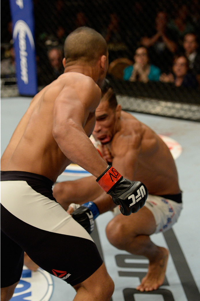 LAS VEGAS, NV - JULY 12: Maximo Blanco (left) punches Mike De La Torre in their featherweight bout during the Ultimate Fighter Finale inside MGM Grand Garden Arena on July 12, 2015 in Las Vegas, Nevada. (Photo by Brandon Magnus/Zuffa LLC/Zuffa LLC via G